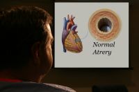 Surgeon showing me an illustration of a normal artery