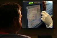 Surgeon showing me the computer screen of the Medtronic heart lung machine