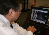 Dr. Michael Harostock checking an image of my damaged heart