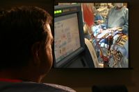 Surgeon showing me a picture of the Medtronic heart lung machine in operation