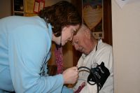 Checking blood pressure during cardiac rehab