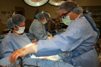 Dr. Harostock adjusting drainage tube