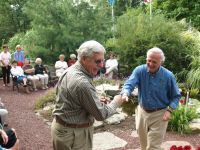 Terry placing his rose