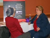 Diane Kane talks with participant